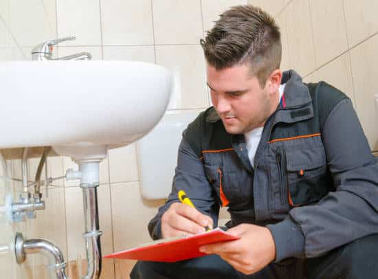 Man performing a Legionella Risk Assessment