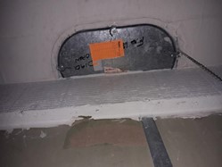 Fire damper obstructed by fire stopping